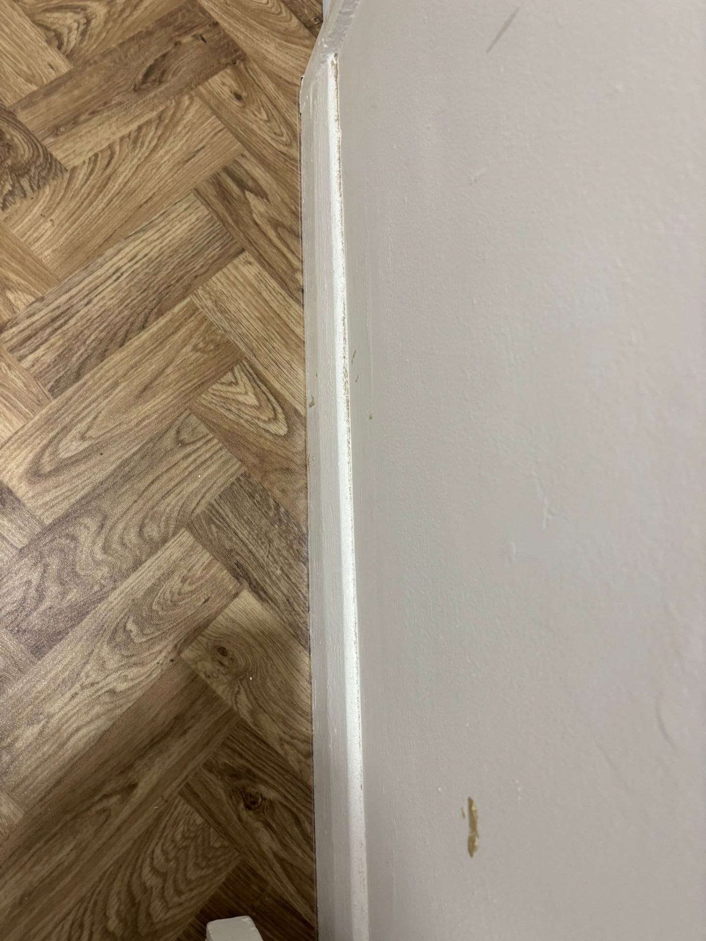 Herringbone laminate skirting detail